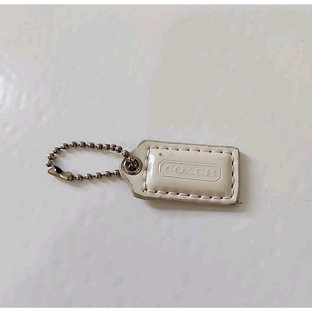 COACH White Leather Embossed Replacement Wallet HangTag Charm Used